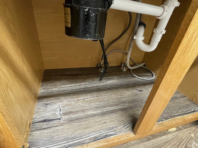 Bottom sink cabinet replacement - after, front view - local rental property
